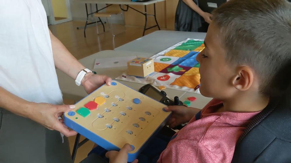 Student learning about Cubetto